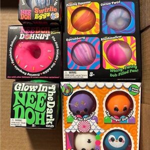 Donut & Doh-Filled Squeeze Toys - Pink, Purple, Orange, White